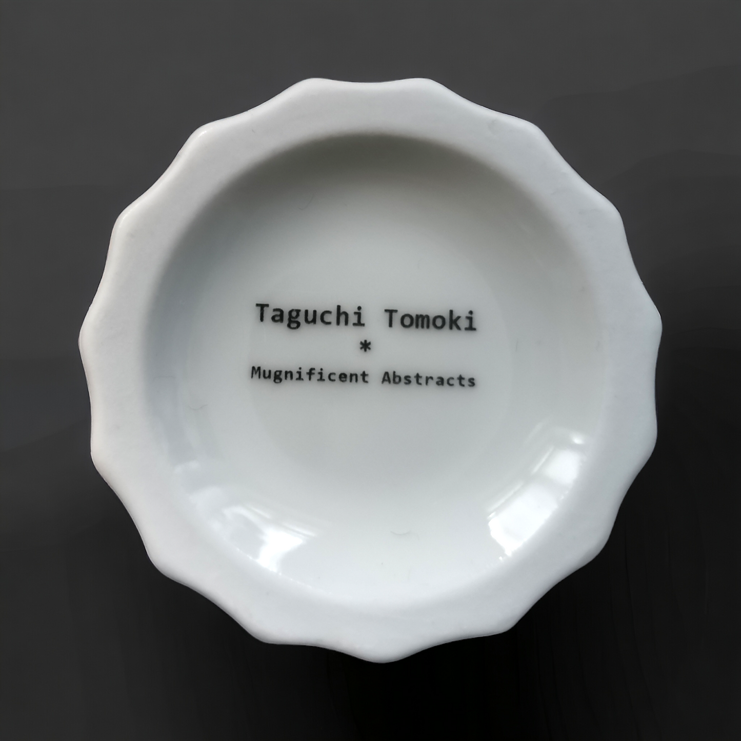 T. TOMOKI GREEN