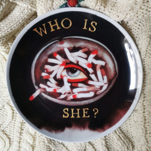 who is she wall plate
