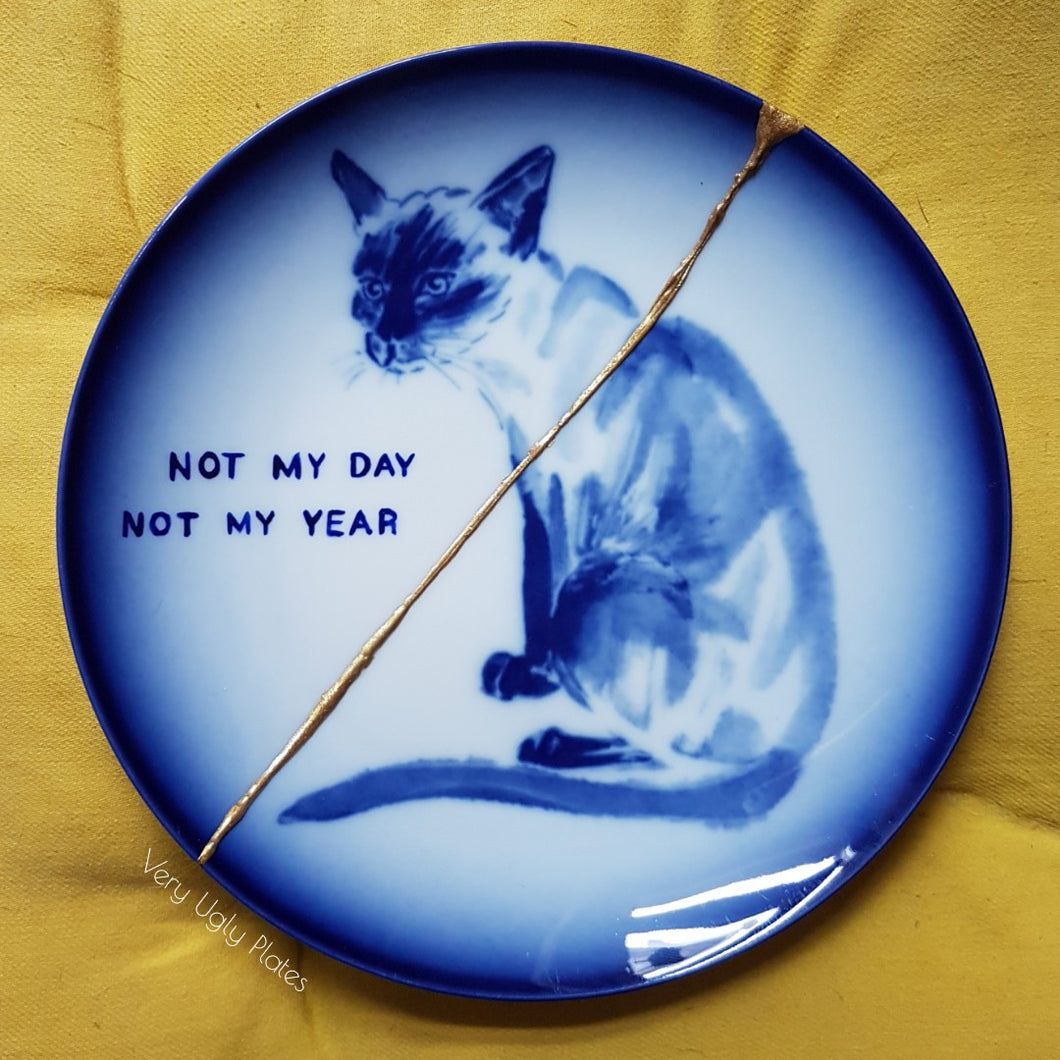 not my day not my year wall plate